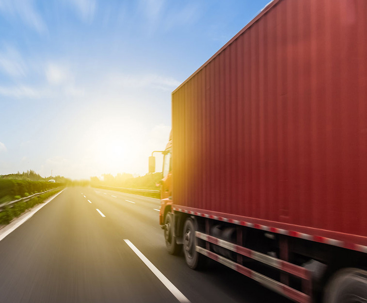 45792421-truck-on-a-fast-express-road-motion-blur-stock-photo-11.jpg